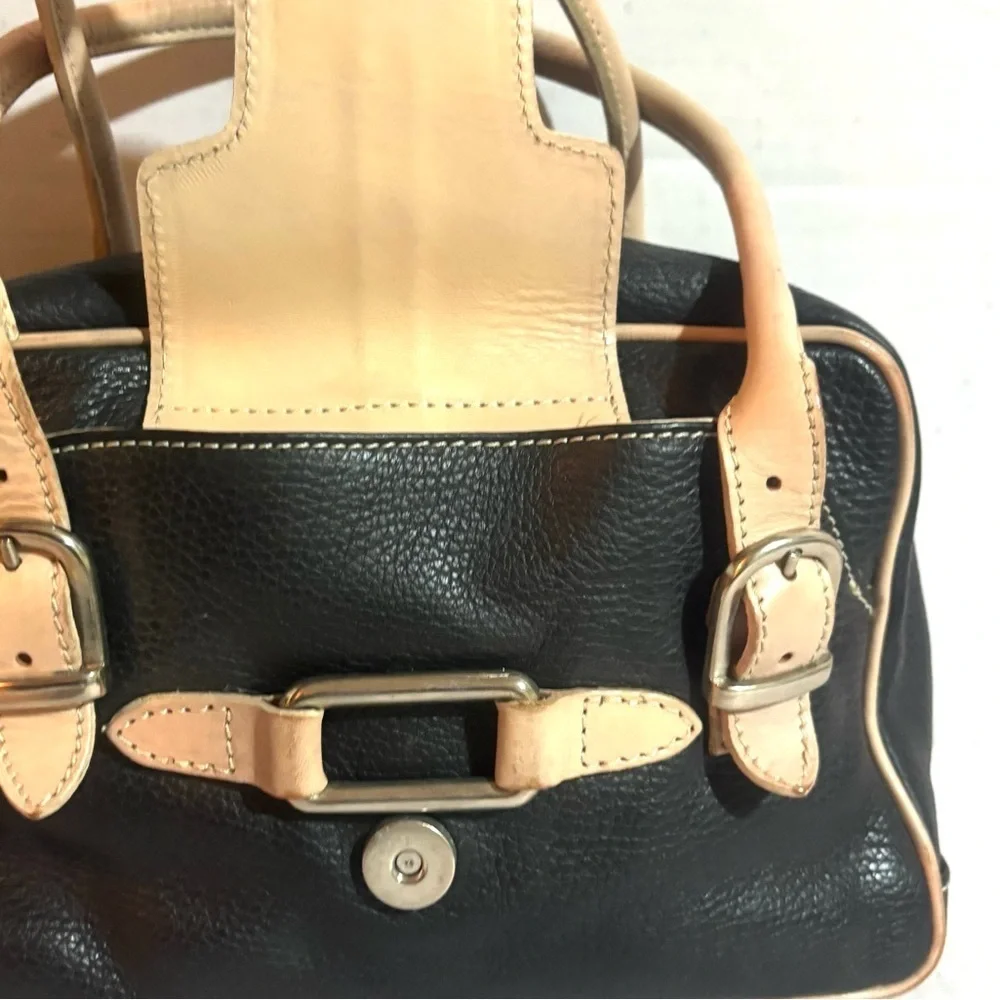 GUIA’S black leather satchel handbag with beige trim